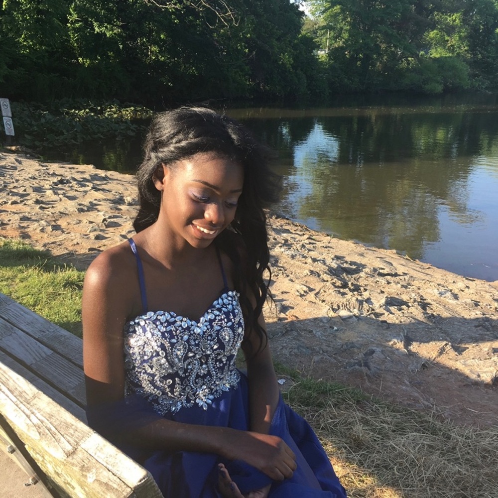Aspeed blue formal dress with silver jewels.